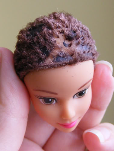 barbie with cut hair